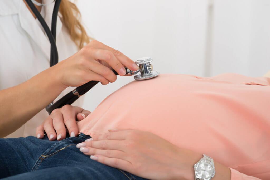 Obgyn Examining Pregnant Woman